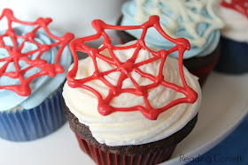 Spider web cupcakes, favor bags, and more ideas for a DIY Spiderman birthday party including a free printable