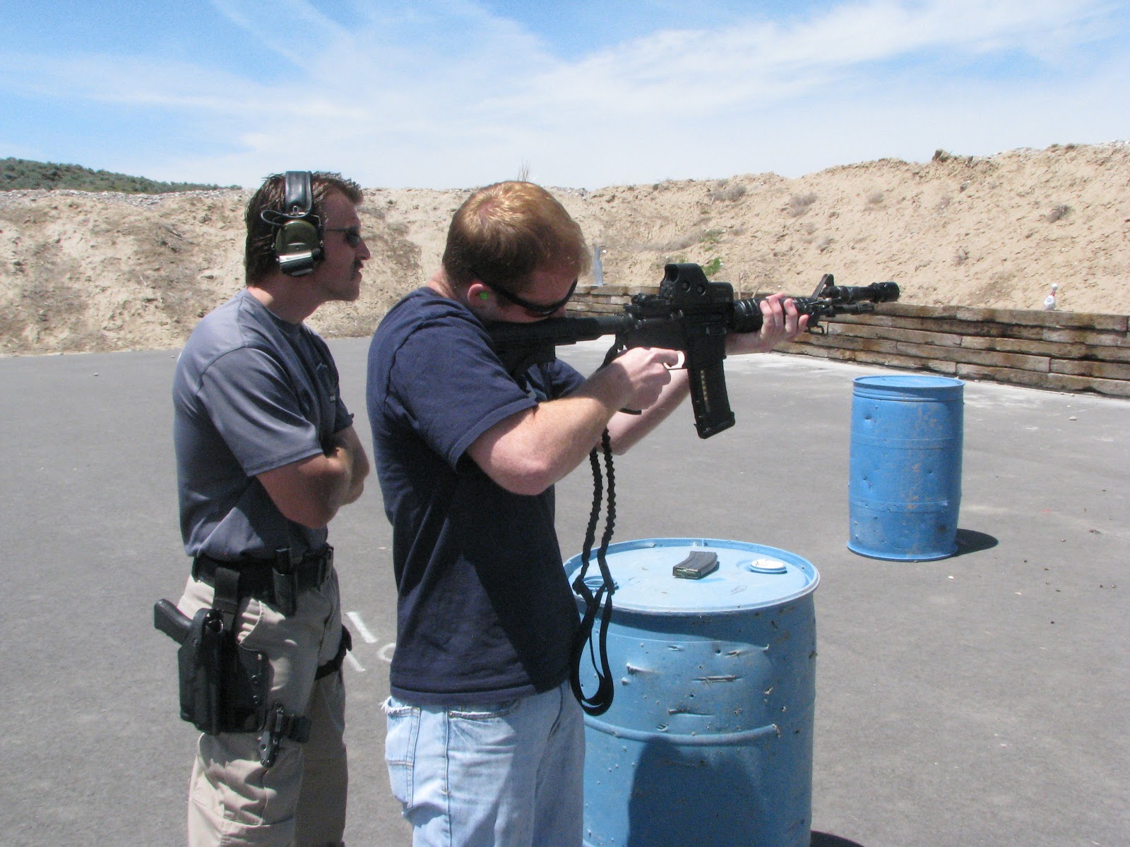 Sgt. Bill Squires spends the day with academy participants at the gun ...