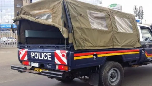 Police in Kericho patrol car photo