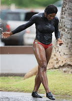 Serena gets out after having a surf on the beach