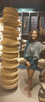 " Shachem Lieuw posing with Cassava bread display in El Centro Leon in the Dominican Republic"