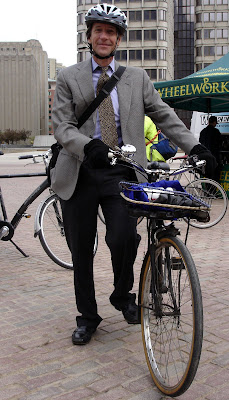 suit sportcoat tie man on Raleigh three speed bike