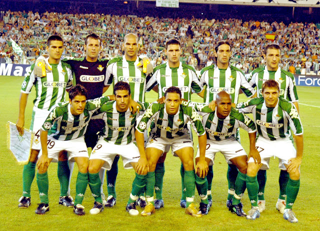 REAL BETIS BALOMPIÉ. Temporada 2005-06. Juanito, Toni Doblas, Rivas, Melli, Arzu, Varela. Óscar López, Fernando, Oliveira, Assunção y Joaquín. REAL BETIS BALOMPIÉ 1 🆚 LIVERPOOL F. C. 2 Martes 13/09/2005, 20:45 horas. Liga de Campeones de la UEFA, fase de grupos, Grupo G, partido 1. Sevilla, estadio Manuel Ruiz de Lopera. GOLES: ⚽0-1: 2’. Sinama-Pongolle. ⚽0-2: 14’, Luis García. ⚽1-2: 52’, Arzu.