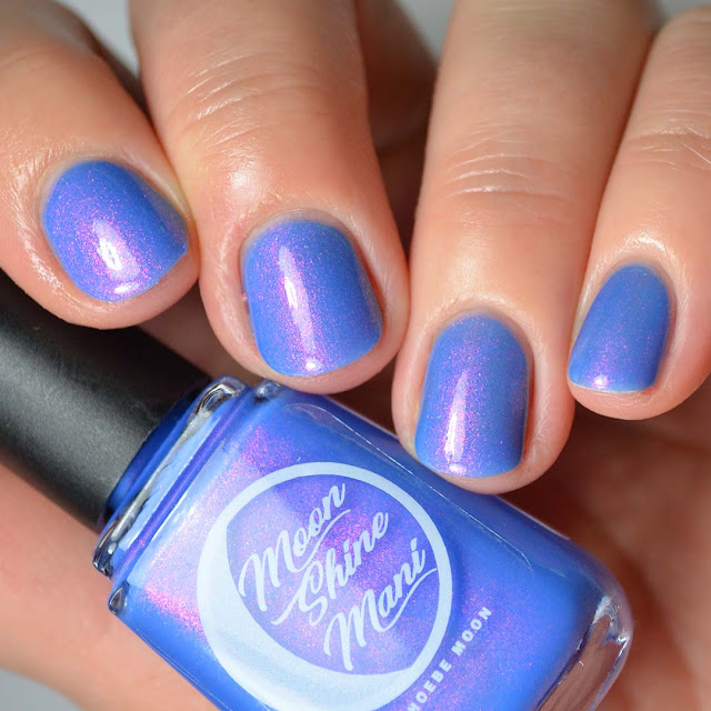 neon blue nail polish with color shifting shimmer