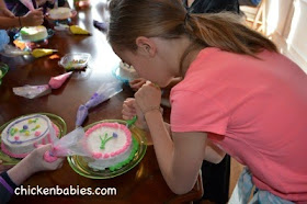 decorating cakes at a tween girl birthday party