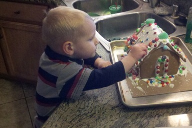 ryan eating gingerbread house (1 of 1)