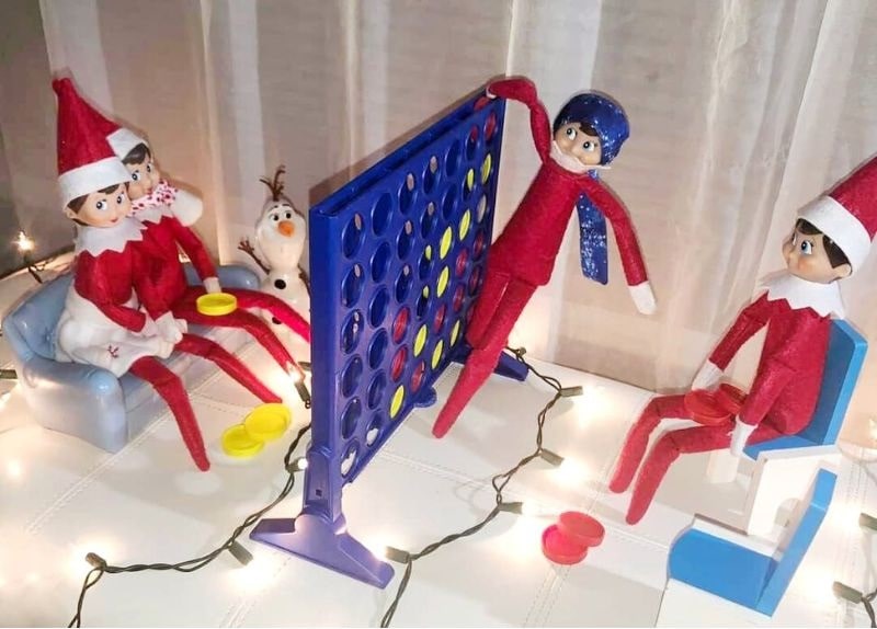 elf on the shelf playing connect 4