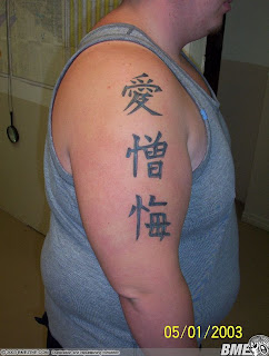 Arm Kanji tattoos