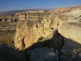 Posing in front of the Cappadocia ancient living quarters