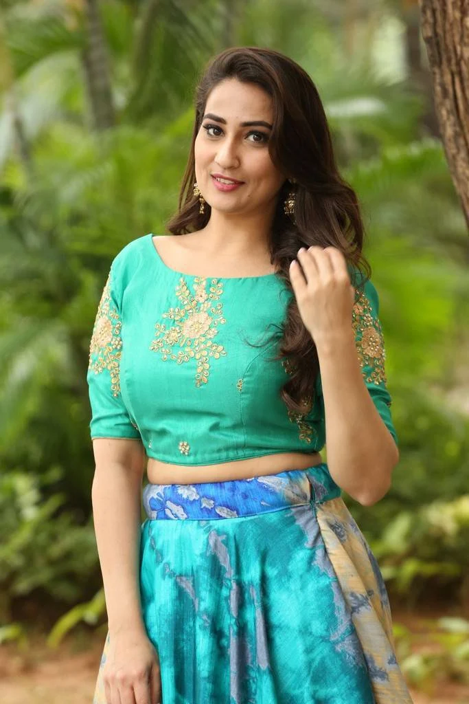Telugu TV Anchor Manjusha In Green Lehenga Choli