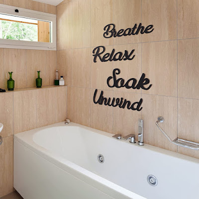 Rustic wooden word signs of relaxation for your bathroom decor