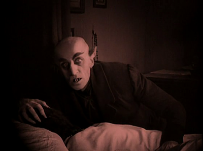 Count Orlok Rises After Sucking Ellen Hutter's Blood all night long, Max Schreck, Directed by F. W. Murnau