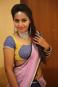 Neetha sizzling photo shoot in half saree-thumbnail-26