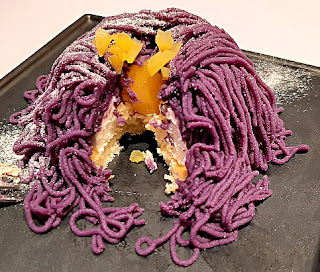 Purple sweet potato mont blanc cut open to show chestnut base
