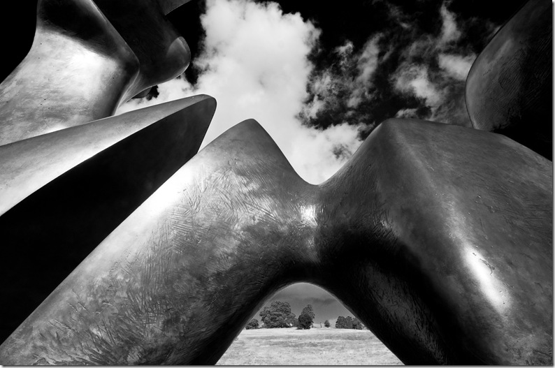 Henry Moore 2 piece reclining figure cut close up