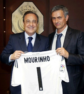 Mourinho with Florentino Perez and the Real Madrid jersey on the hands