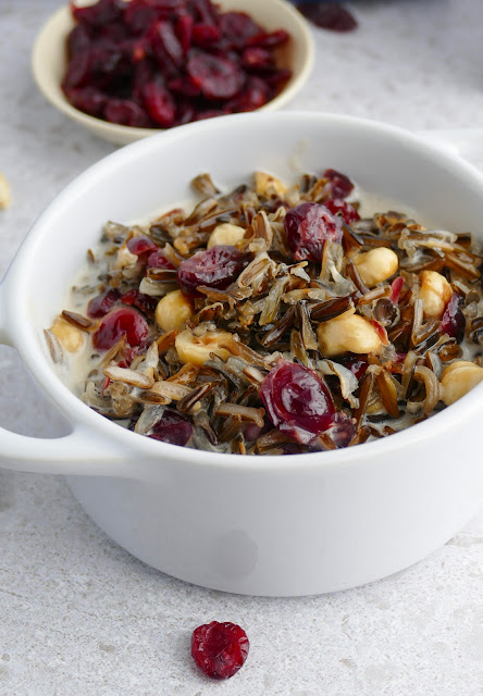 Wild Rice Porridge in a white bowl.