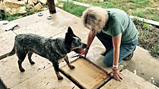 Stells and Lee mark out limestone blocks to be cut.