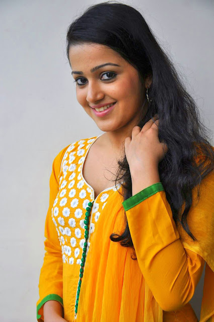 Samskruthy Shenoy's Sunshine Vibes: Cute Images in Vibrant Yellow Dress.