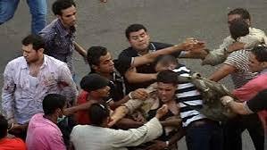 عامل يمزق جسد طالب "بسنجه" فى طما بسوهاج ويحاول ذبحه بسبب خلافات مالية