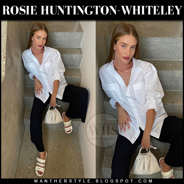 Rosie Huntington-Whiteley in white shirt, black pants and white sandals