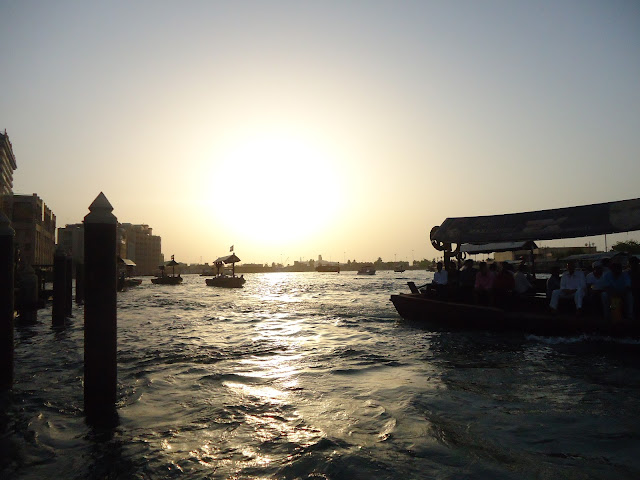 Sunset view while riding the Abra in Dubai Creek