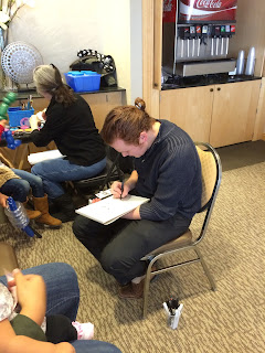 A Caricature Artist Drawing a family in Utah