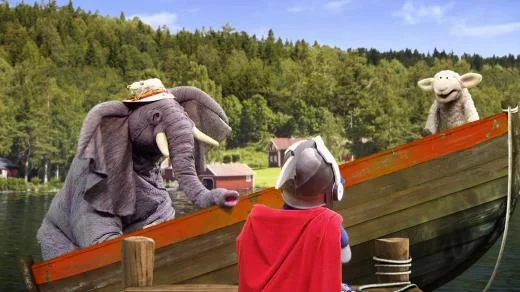 Sesame Street Episode 4272. Super Grover appears to help an elephant and a sheep, their boat is uneven.