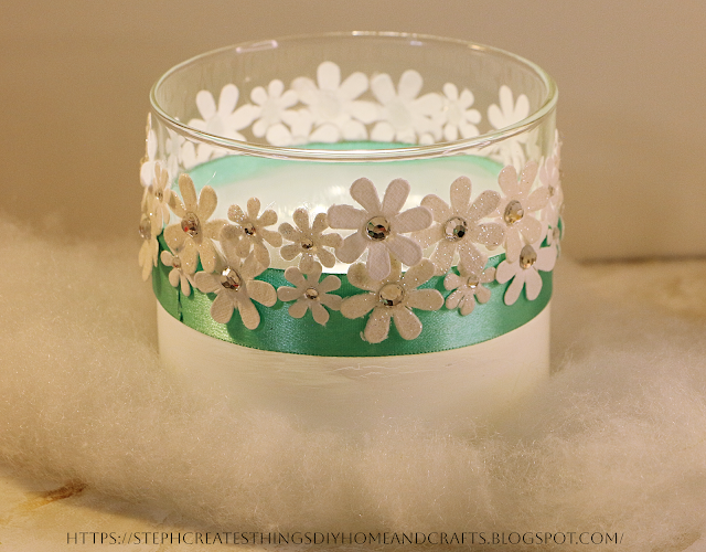 Shimmery flower glass jar light display