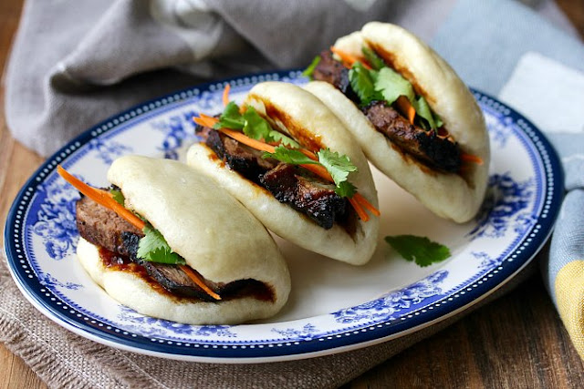 Bao Buns with picked vegetables and filled with char sui