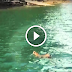 America's Most Elusive Predator Spotted Swimming Across Lake