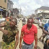 Soldiers Beaten To Pulp In Ajegunle, Lagos Over Death Of ‘Black Jesus’. Graphic Photos