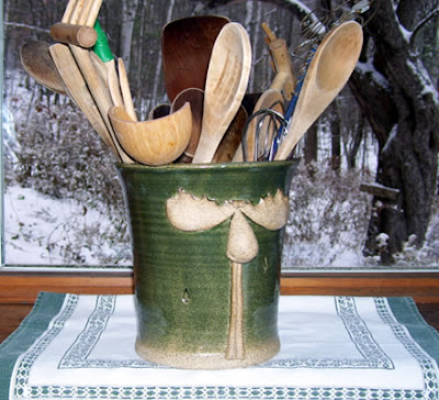 stoneware utensil holder with moose