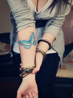 TATTOOS EN ANTEBRAZO DE MARIPOSA