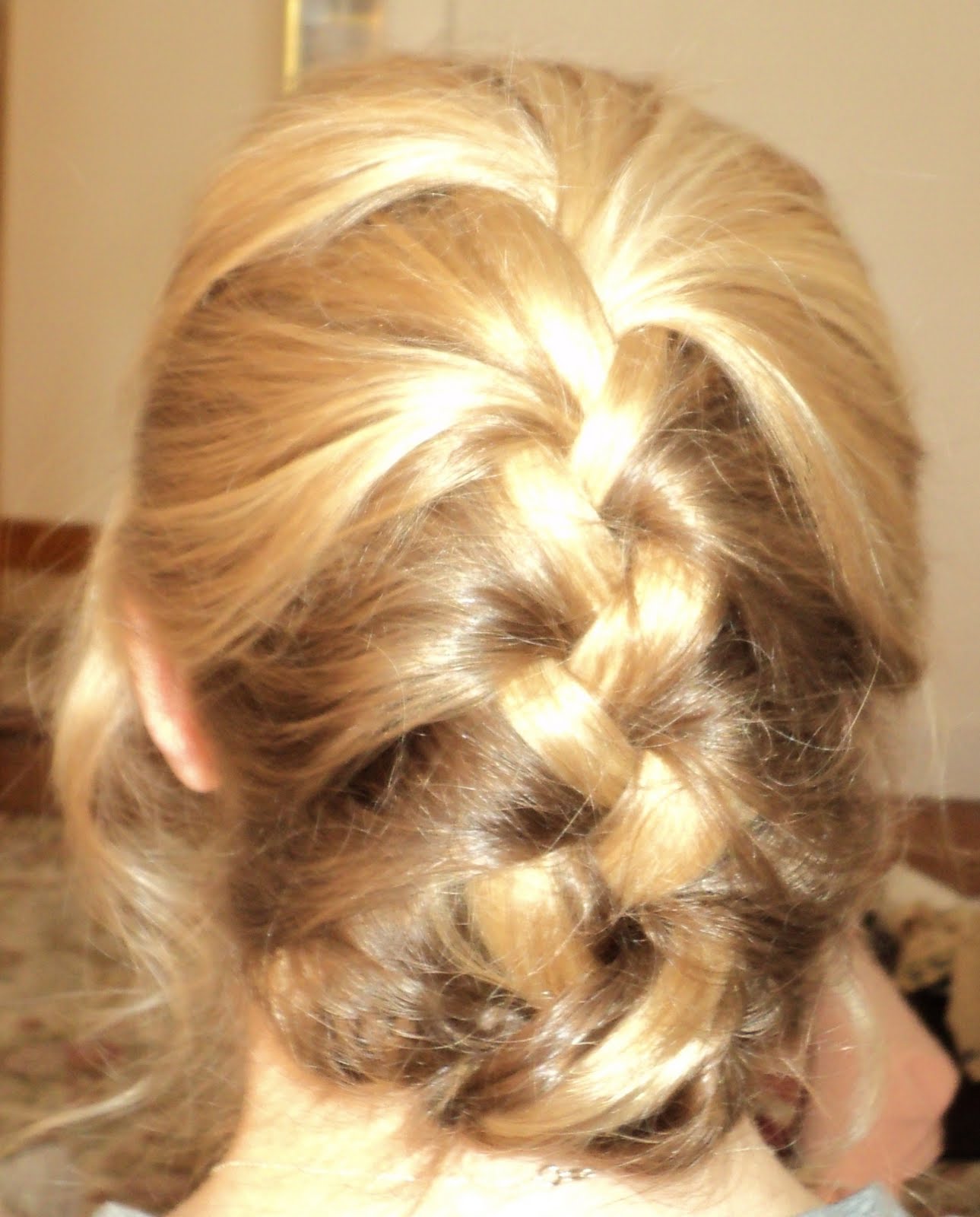 braided updo: My hair was french braided, then tucked under. The  title=
