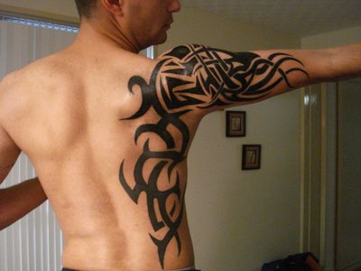 sleeve tribal tattoos. This half sleeve tattoo