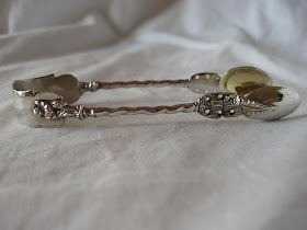 APOSTLE TOPPED TONGS, STERLING SILVER, LONDON 1889 