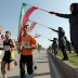 Female Tehran marathon participants forced to run inside