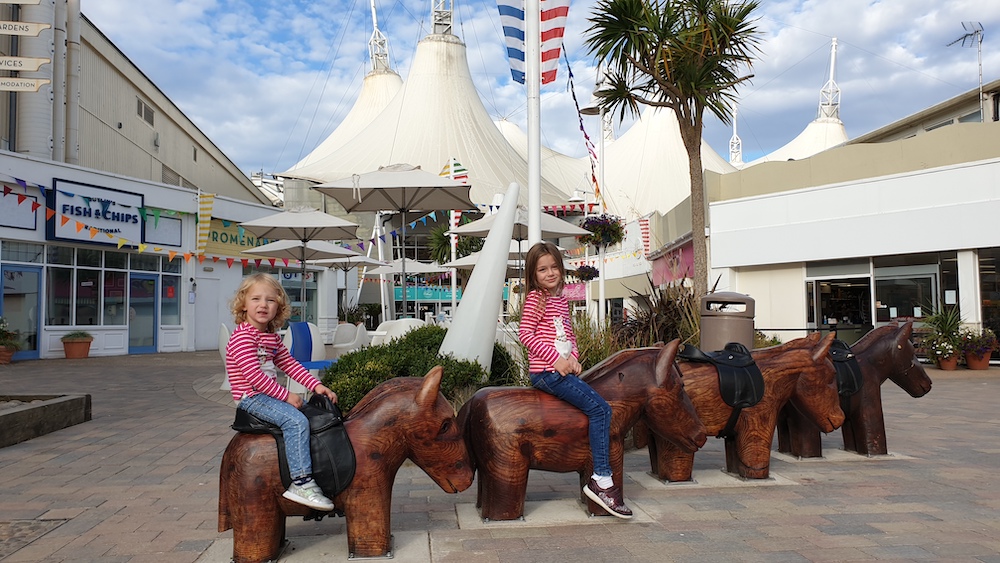 two girls in front of skyline at butlins