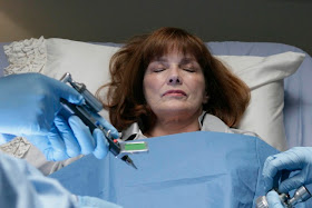 FRINGE: Nina (Blair Brown) fights to stay alive in the FRINGE season finale episode 'There's More Than One of Everything' airing Tuesday, May 12 (9:01-10:00 PM ET/PT) on FOX. ©2009 Fox Broadcasting Co. CR: Craig Blankenhorn/FOX