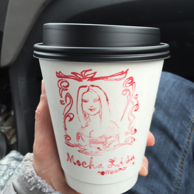 Mocha Lisa coffee cup