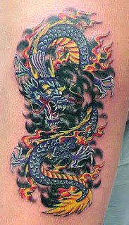 Mark dragon arm tattoo