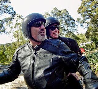 Happy girl on a motorbike