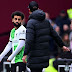 Tension Flares: Geeky Mo Salah and Gergy Klopp dash with each other on touchline in drawing Liverpools playing at West Ham.