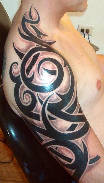 Left shoulder tattoo. USMC Tribal Tattoo.
