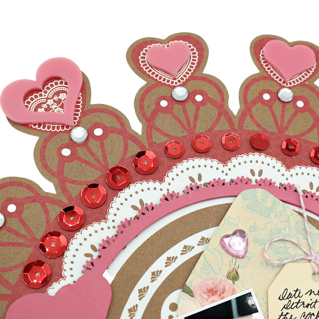 Date night scrapbook layout embellished with pink acrylic hearts, clear rhinestones, red sequins, and painted chipboard frame and title.