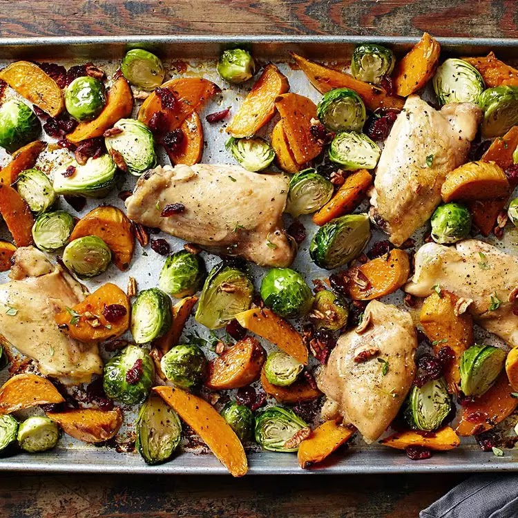 This easy sheet-pan recipe brings together many fall favorites into a hearty dinner.