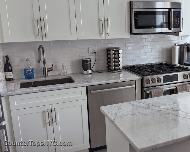 white kitchens with marble countertops