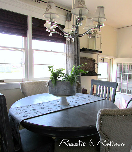 Home Tour of an updated kitchen with ebony stained cabinetry, an eat-in kitchen table and functional butlers pantry.