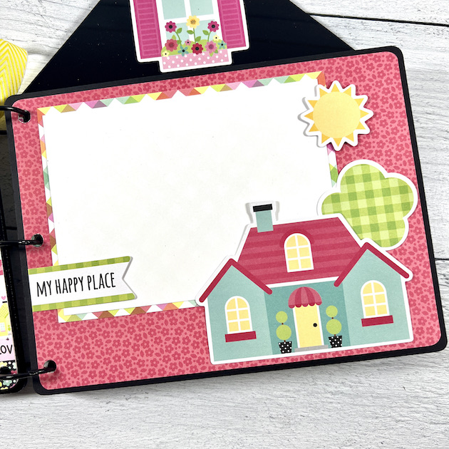 house shaped scrapbook album page with home die cut